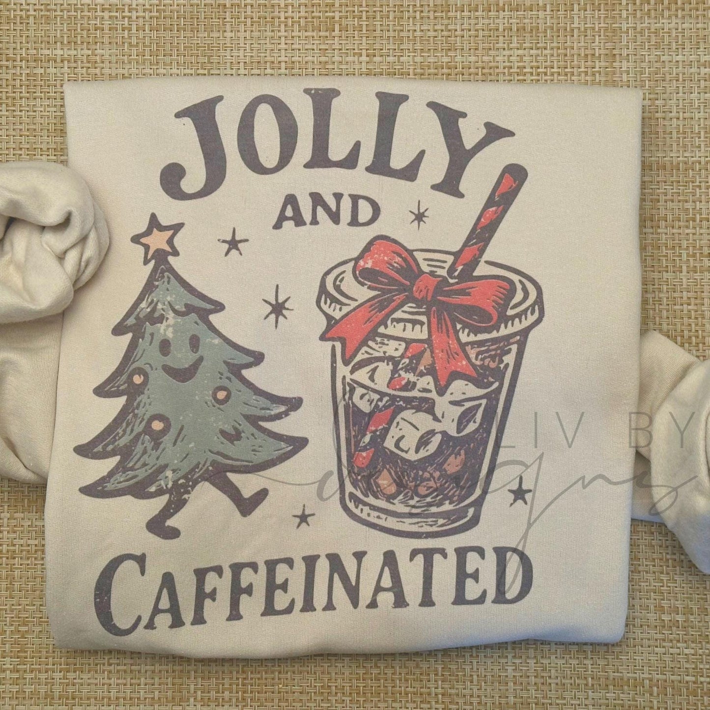 Close-up of holiday sublimation print with Christmas tree and iced coffee cup