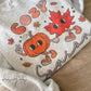 Fall sublimated Cozy Season sweater folded for display. (etsy image id: 6765536514)