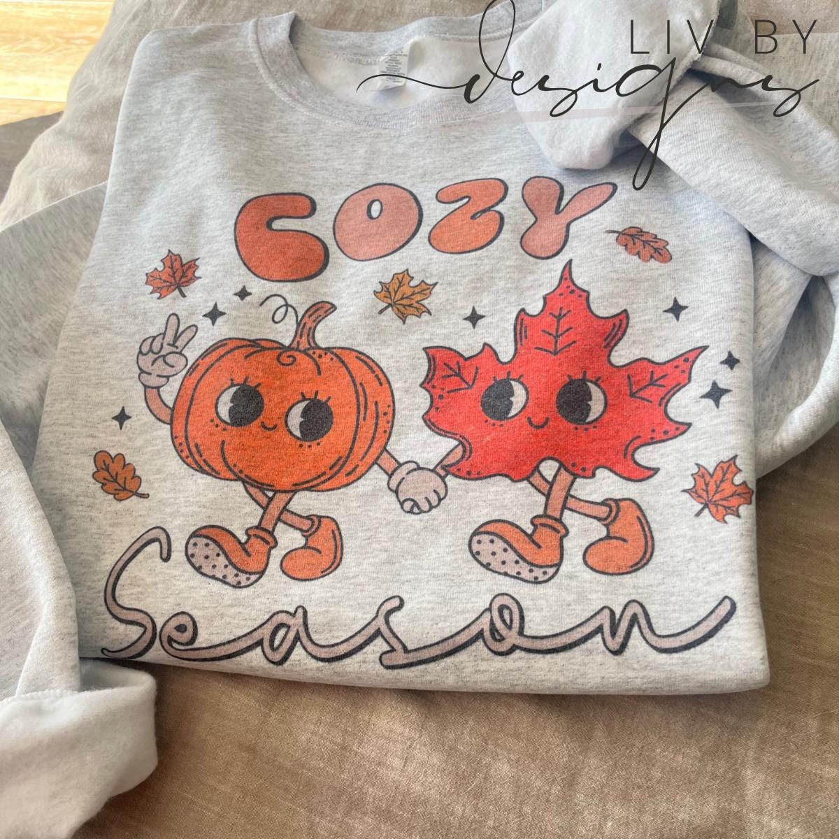 Cute autumn pumpkin and leaf pullover on Gildan crewneck. (etsy image id: 6765536666)
