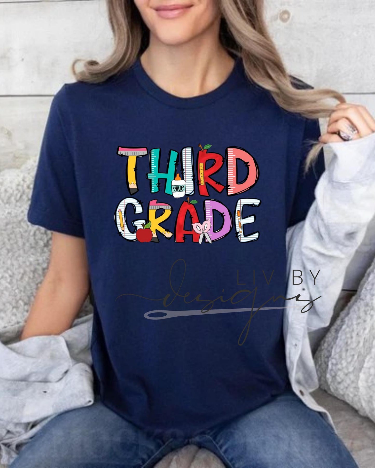 Comfort Colors Third Grade teacher shirt in navy with vibrant school supply graphics (etsy image id: 6862741261)