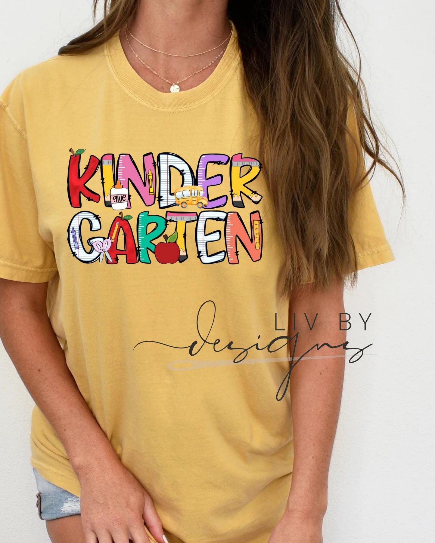 Comfort Colors Kindergarten teacher shirt in Mustard with bright DTF transfer design (etsy image id: 6862741283)