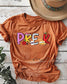 Comfort Colors Pre-K teacher shirt in YAM with colorful DTF school-themed design (etsy image id: 6862741311)