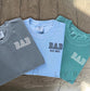 “Three Comfort Colors DAD EST shirts in gray, blue jean, and chalky mint stacked on wood background” (etsy image id: 6936738119)