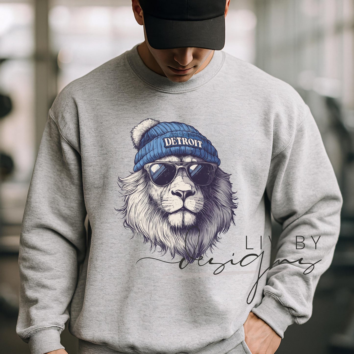 Close-up of DTF-printed Detroit lion spirit animal design on a male model featured on a Gildan crewneck. (etsy image id: 7149127731)