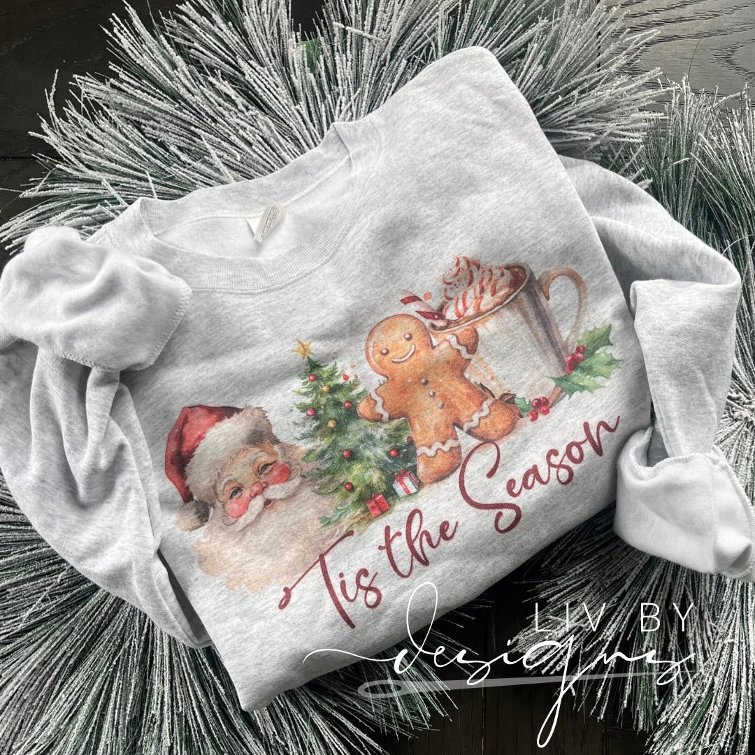 Vintage Christmas crewneck sweatshirt with Santa, gingerbread, cocoa and tree sublimation design on ash grey Gildan sweater (etsy image id: 7301169822)