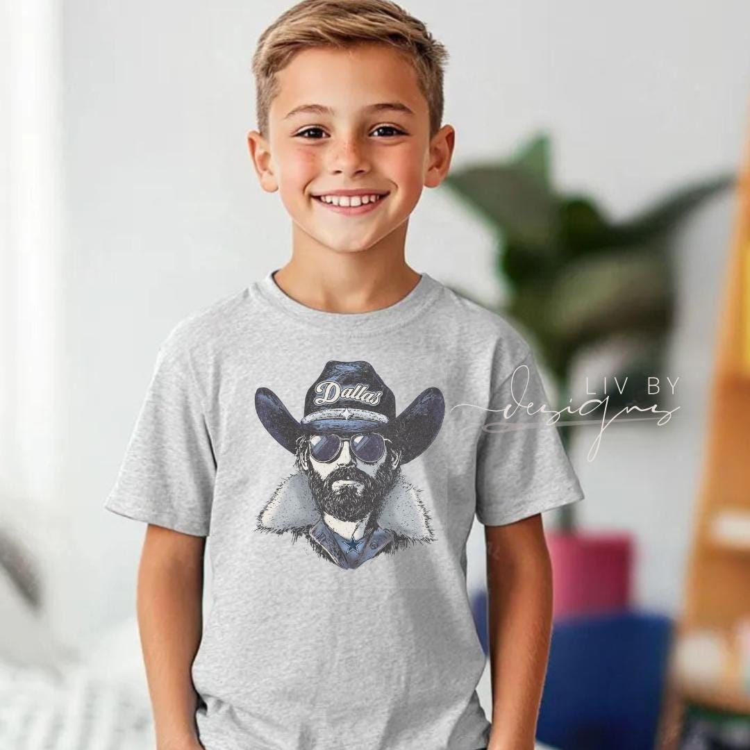 Youth boy wearing Dallas Cowboys cowboy sublimated graphic t-shirt in ash grey (etsy image id: 7325130804)