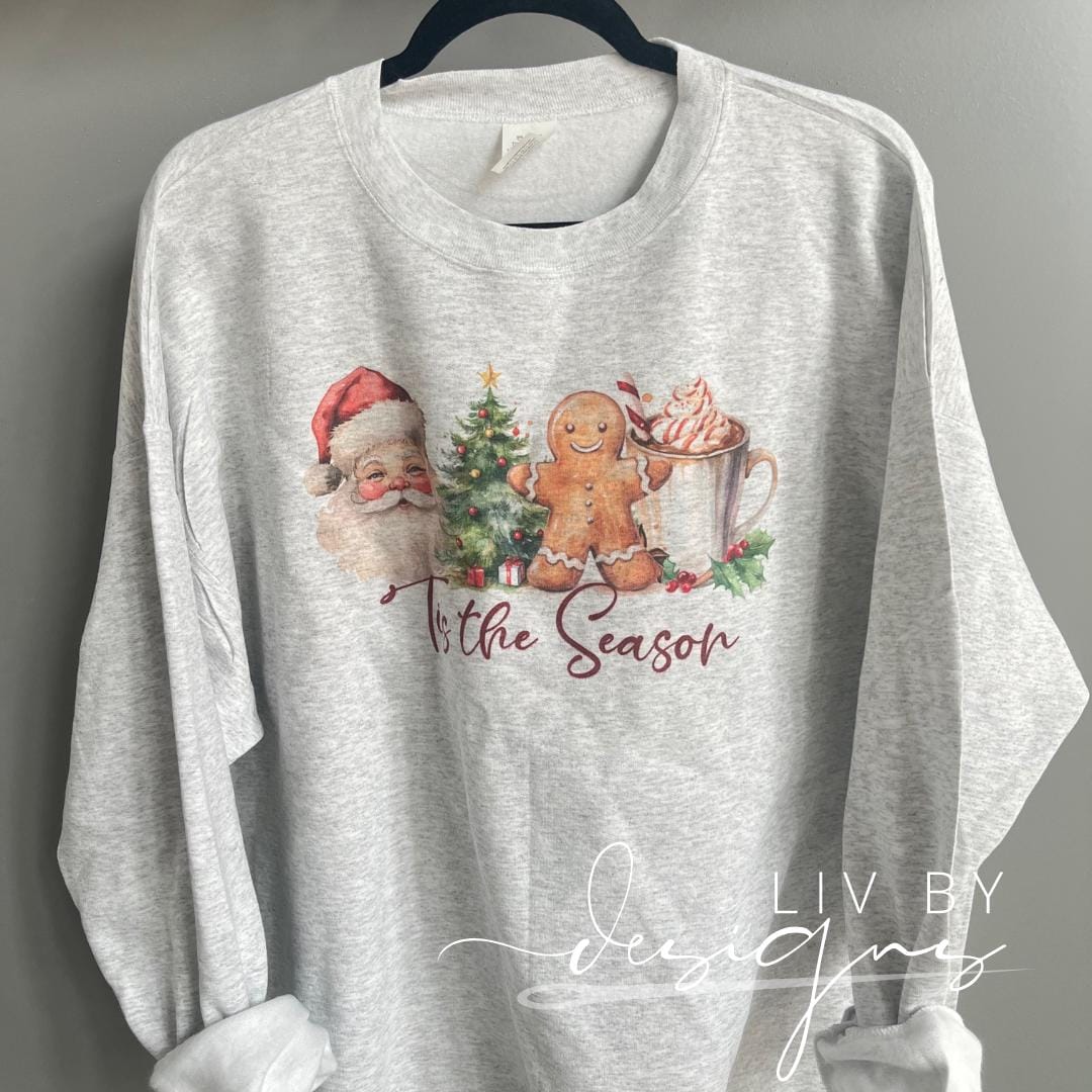 Tis the Season retro holiday graphic sweater hanging on hanger – sublimated Christmas crewneck (etsy image id: 7349122185)