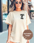 Front view of "Child of God" Comfort Colors T-shirt in ivory with chest design (etsy image id: 7464967104)