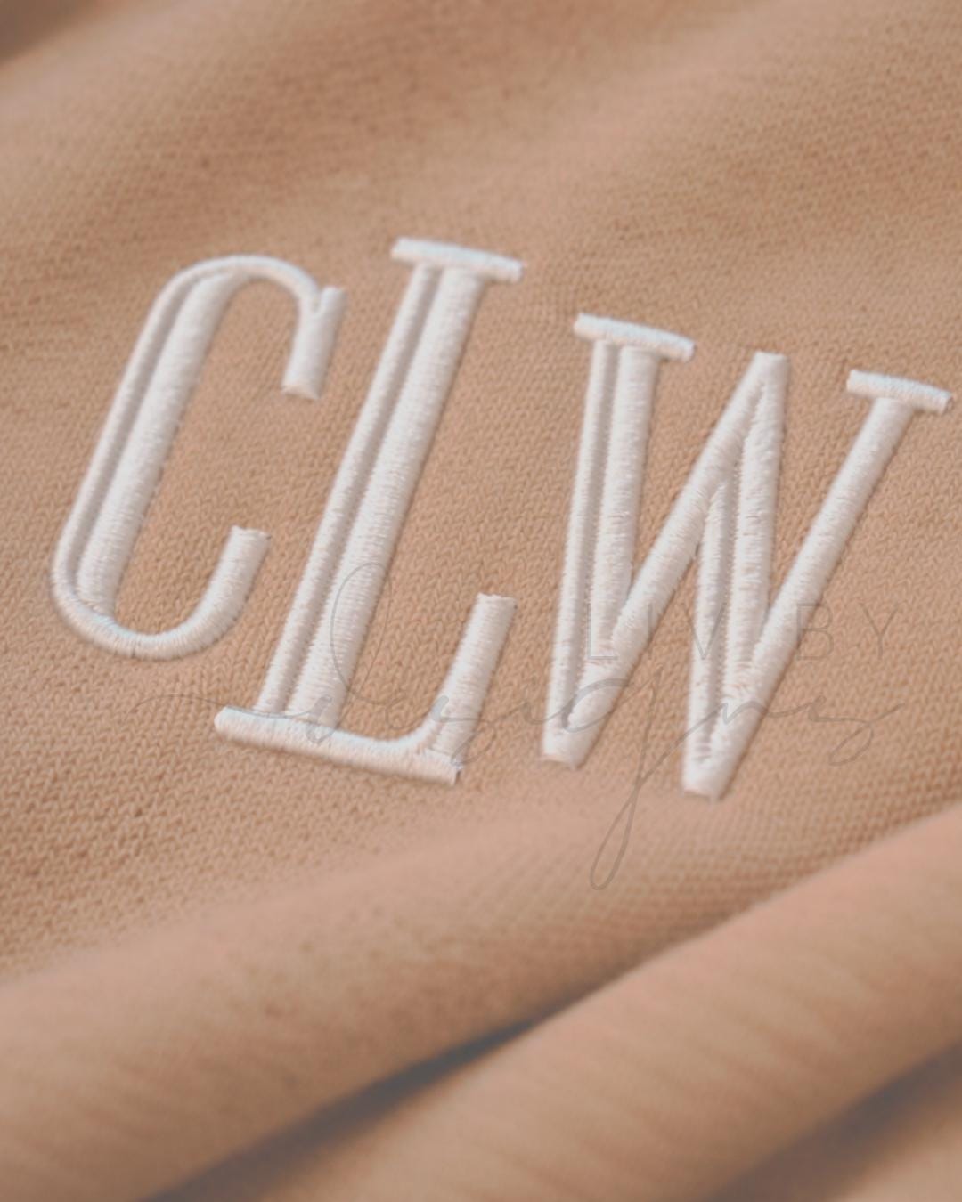 Detailed image Embroidered monogram Bella and Canvas crewneck sweatshirt in neutral tan color with white stitched initials (etsy image id: 7613596710)