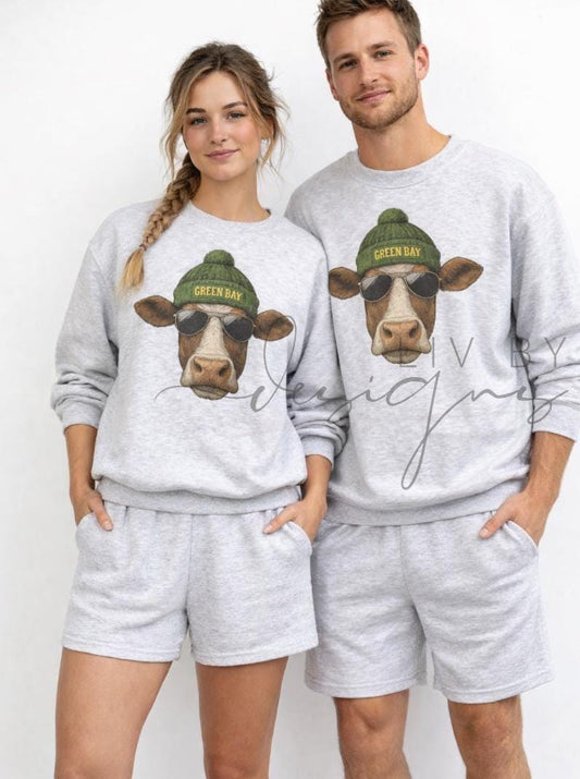 Model couple showing off their green bay packers spirit animal sublimated crewnecks (etsy image id: 7683024463)