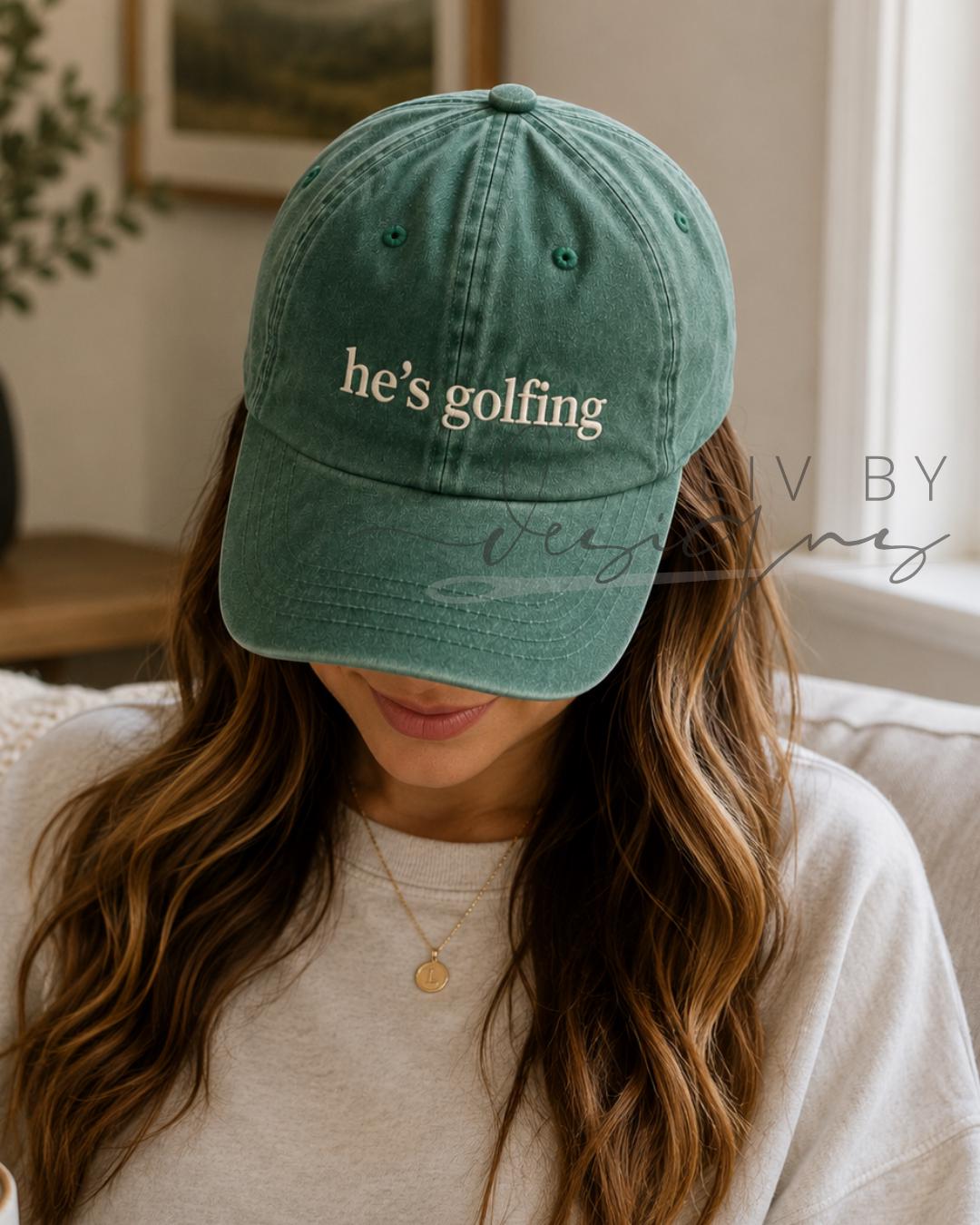 He's Golfing Embroidered Hat | Hat for Mom during Golf Season | Busy Mom Gift Humorous Golf Cap (etsy image id: 7992347938)